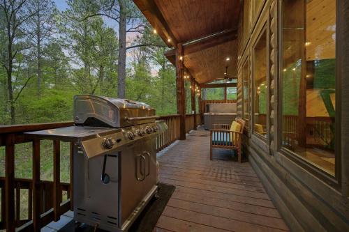 a grill on a porch of a house at Misty Mountain in Stephens Gap