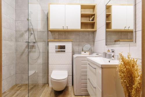 Et badeværelse på Stylowe apartamenty