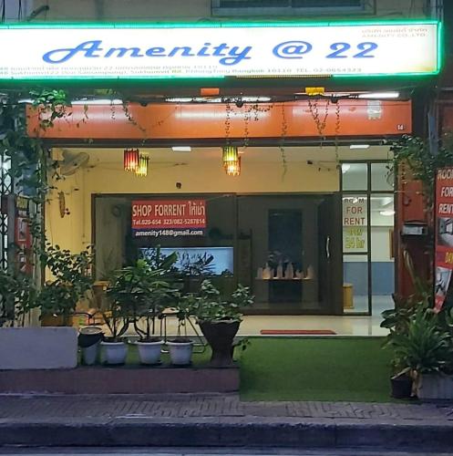 a store front with plants in front of it at amenity@22 in Bangkok