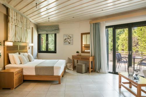 Postel nebo postele na pokoji v ubytování Daluz Boutique Hotel