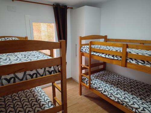 Posteľ alebo postele v izbe v ubytovaní Apartament Roses Platja-Ciutadella