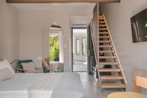 Postel nebo postele na pokoji v ubytování Daluz Boutique Hotel
