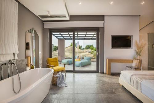 Postel nebo postele na pokoji v ubytování Daluz Boutique Hotel