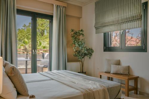 Postel nebo postele na pokoji v ubytování Daluz Boutique Hotel