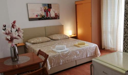 Posteľ alebo postele v izbe v ubytovaní Studio Makarska 6850b