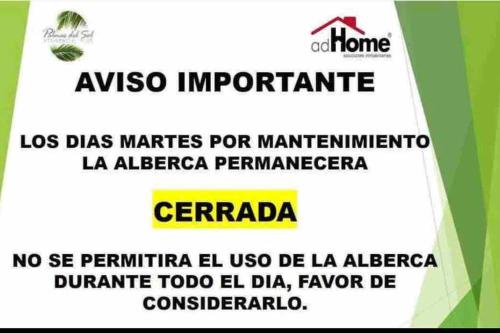 a sign for a pharmacy with the wordsyssosentoento and another sign for at Nuevo penthouse con terraza privada, alberca , area infantil y pet friendly in Manzanillo