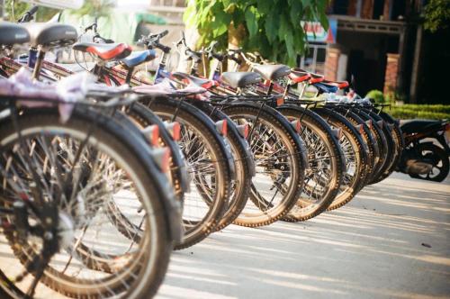 a row of bikes parked next to each other at Central Backpackers Hostel - Phong Nha in Phong Nha