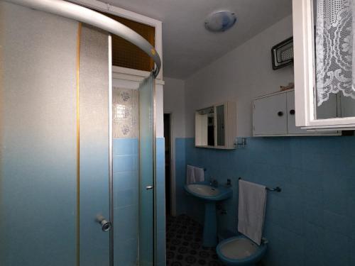 a bathroom with a shower and a toilet and a sink at Apartment Mili - 50m from beach in Sutomišćica