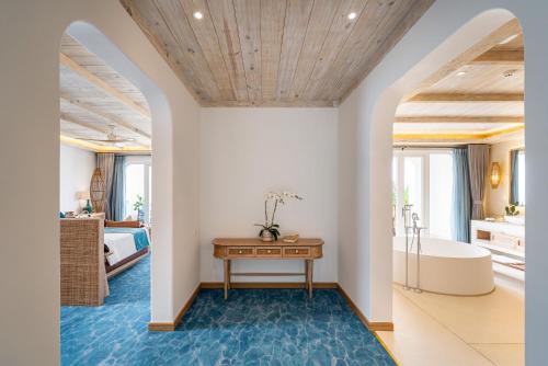 Postel nebo postele na pokoji v ubytování Stelia Beach Resort