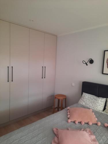 Apartament Jak w Domuにあるベッド