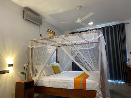 Katil atau katil-katil dalam bilik di Hanthana House