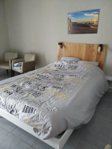 En eller flere senge i et værelse på Sous le soleil des Landes