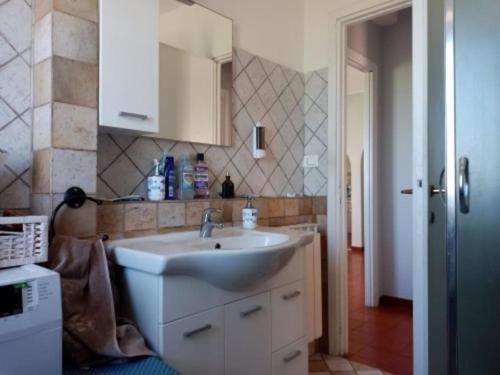 Et badeværelse på Appartamento luminosissimo con vista panoramica
