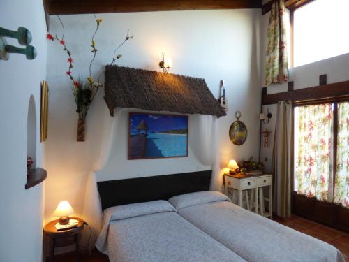 Postel nebo postele na pokoji v ubytování Hotel Albergue Bioclimático Sabinares del Arlanza