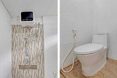 Phòng tắm tại Capital O 91384 Rintaka Residence
