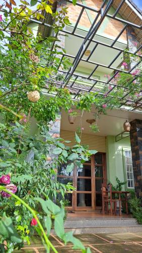 a house with a conservatory with a glass roof at 288 Villa in Da Lat