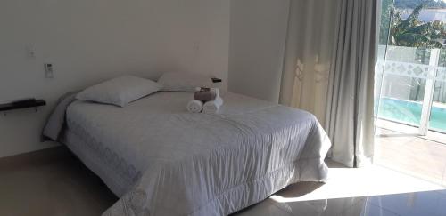 Postel nebo postele na pokoji v ubytování Quinta do Lapa
