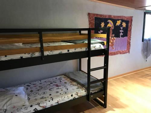 Postel nebo postele na pokoji v ubytování Le Flamboyant avec piscine chauffée 30° et Jacuzzi
