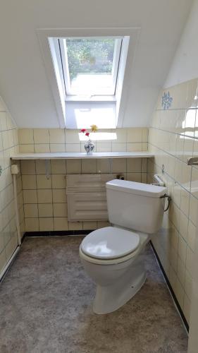 Salle de bains dans l'établissement Atina Hotel