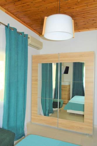 Hephaestus Appartments Litochoro -A1にあるベッド