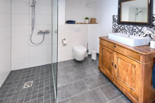Ένα μπάνιο στο Ferienwohnung Im Weingewölbe
