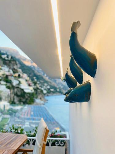a bunch of bananas hanging from a wall at Villa Diamond Luxury Suite in Positano
