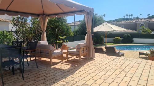 Πισίνα στο ή κοντά στο Dunas Douradas Beach Villa