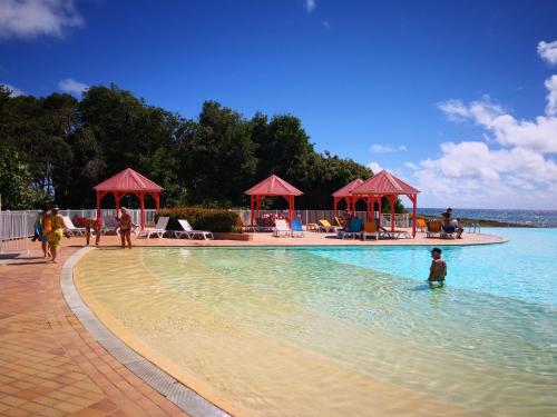 Piscina en o cerca de LeLagon Vue Mer, Pieds dans l'eau