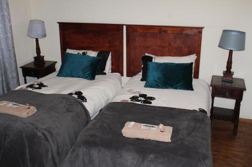Ein Bett oder Betten in einem Zimmer der Unterkunft Magoebaskloof Getaway
