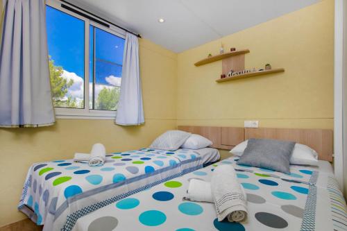 Postel nebo postele na pokoji v ubytování Guest house Punta