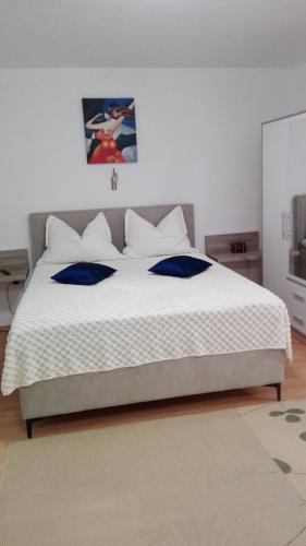 Ένα ή περισσότερα κρεβάτια σε δωμάτιο στο STUDIO APARTMAN Marita