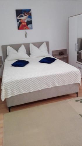 Ένα ή περισσότερα κρεβάτια σε δωμάτιο στο STUDIO APARTMAN Marita