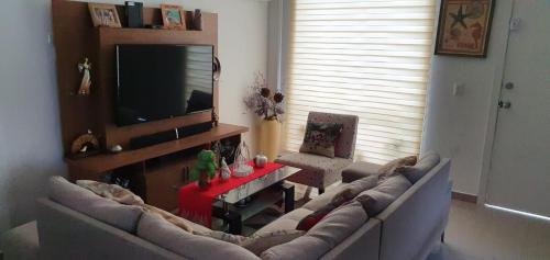 Una televisión o centro de entretenimiento en Villa
