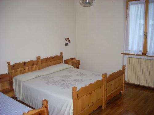 Postel nebo postele na pokoji v ubytování Baita de Ciano