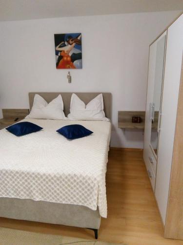 Ένα ή περισσότερα κρεβάτια σε δωμάτιο στο STUDIO APARTMAN Marita