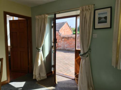 an open door leading to a patio outside at Never to be booked in York