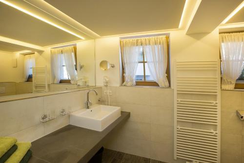 Ένα μπάνιο στο Hotel Tanzer