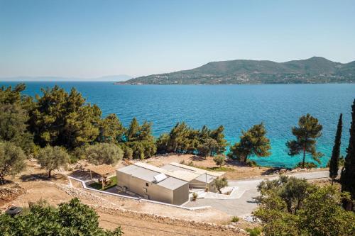 an aerial view of a large body of water at Blue Garden Samos Apartments in Samos