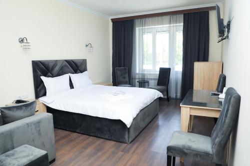 Postel nebo postele na pokoji v ubytování Aragast Hotel & Brewery