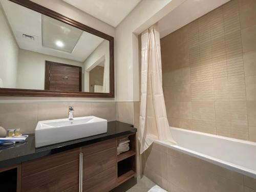 Ванная комната в GOODWOOD SUITES HOMES VACATION
