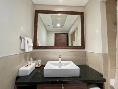 Ванная комната в GOODWOOD SUITES HOMES VACATION