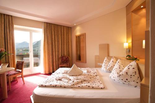 Postel nebo postele na pokoji v ubytování Hotel Elisabeth