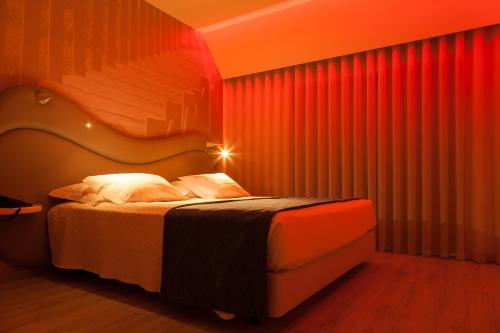 Postel nebo postele na pokoji v ubytování Varzinn Hotel