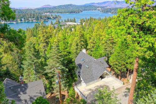 an aerial view of a house in the trees at Love It Up Here! at Lake Arrowhead Lakeview 5 bedrooms 2 lofts 4 decks in Lake Arrowhead