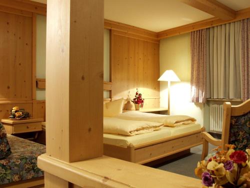 Postel nebo postele na pokoji v ubytování AKZENT Hotel Am Bach