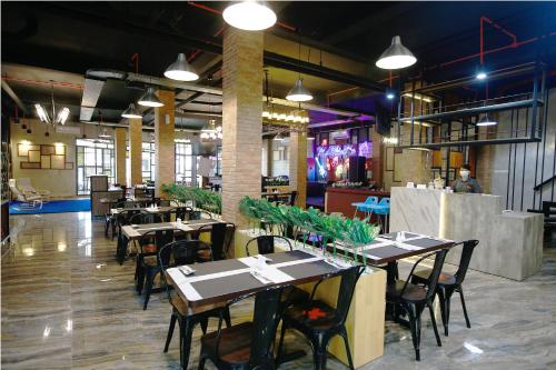 En restaurant eller et andet spisested på Rid's Hotel Palembang