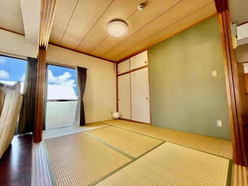 Katil atau katil-katil dalam bilik di ホテル天使館 久茂地 -Tenshi-Kan-