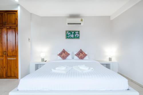 Ένα ή περισσότερα κρεβάτια σε δωμάτιο στο Prinz Garden Villa