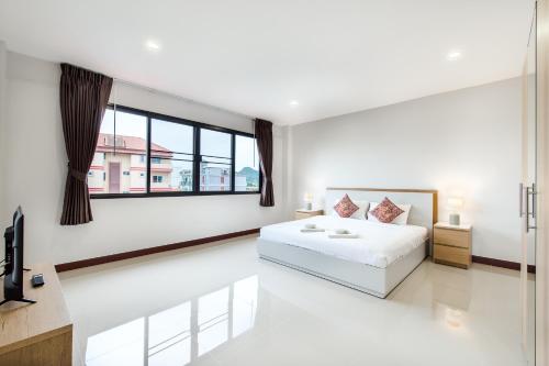 Ένα ή περισσότερα κρεβάτια σε δωμάτιο στο Prinz Garden Villa
