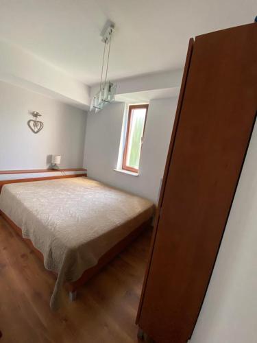 Posteľ alebo postele v izbe v ubytovaní Apartamenty Żeromskiego przy promenadzie i morzu